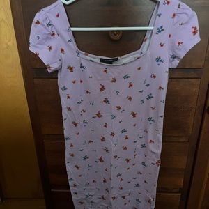 lavender body con dress with flowers.